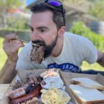 Michael McDonald enjoying the BBQ sample plate from Black Iron Smokers